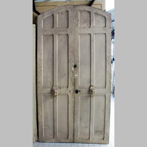 Narrow wooden double door.
