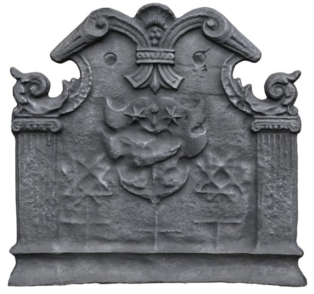 Antique cast iron fireback with coat of arms with a sword and two stars, two ionic pilasters and leather cut pattern, late 17th century  Antique cast iron fireback with coat of arms with a sword and two stars, two ionic pilasters and leather cut pattern, late 17th century -0