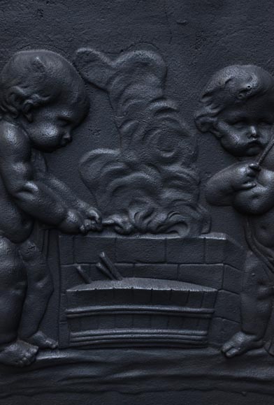 Putti Forging Cupid's Arrows, antique cast iron fireback Putti Forging Cupid's Arrows, antique cast iron fireback-3