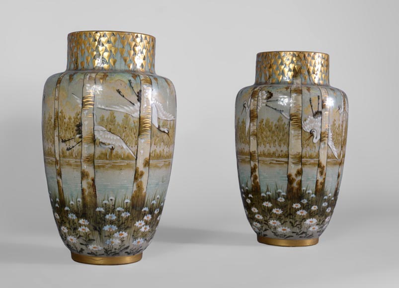 Manufacture KELLER & GUERIN in Luneville - pair of vases decorated with storks in flight in a lake landscape Manufacture KELLER & GUERIN in Luneville - pair of vases decorated with storks in flight in a lake landscape-1