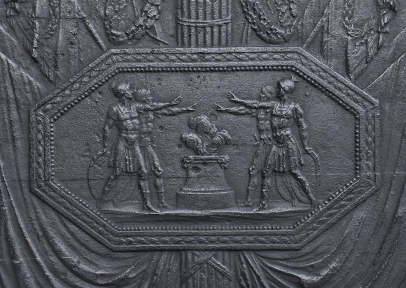 Antique large cast iron fireback inspired by  Antique large cast iron fireback inspired by