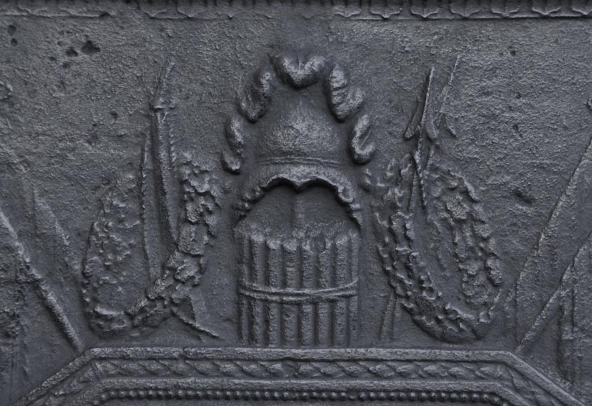 Antique large cast iron fireback inspired by  Antique large cast iron fireback inspired by