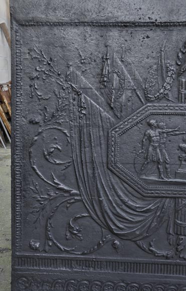 Antique large cast iron fireback inspired by  Antique large cast iron fireback inspired by