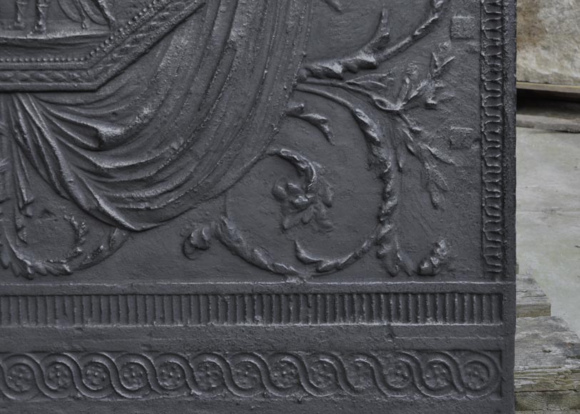 Antique large cast iron fireback inspired by  Antique large cast iron fireback inspired by