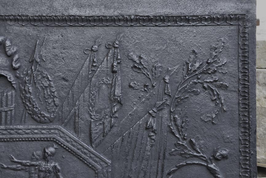 Antique large cast iron fireback inspired by  Antique large cast iron fireback inspired by