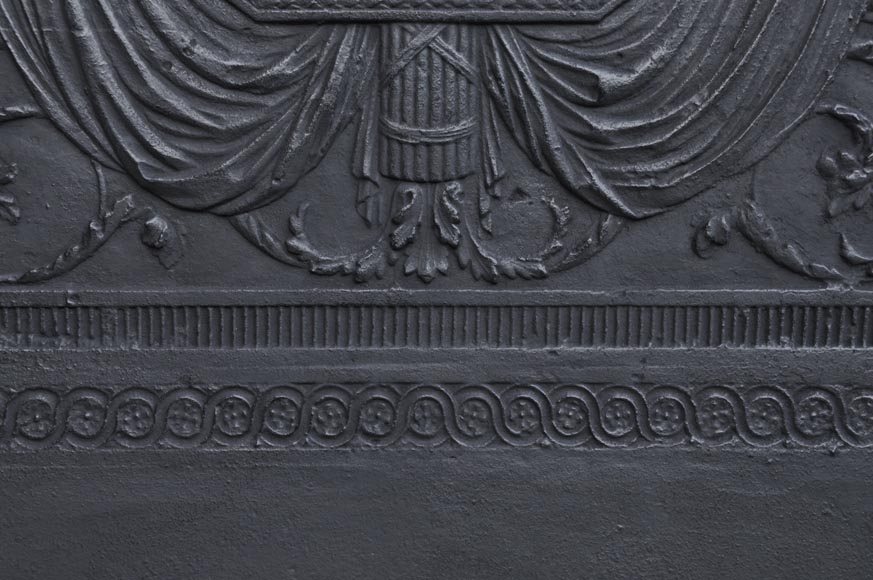 Antique large cast iron fireback inspired by  Antique large cast iron fireback inspired by