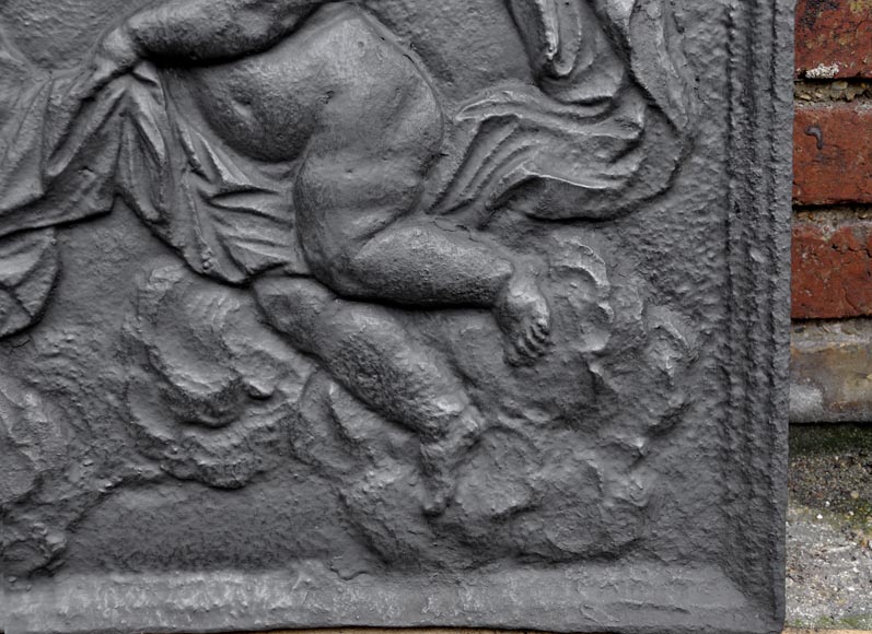 Antique fireback dated 1693 with winged putto holding a torch Antique fireback dated 1693 with winged putto holding a torch-2