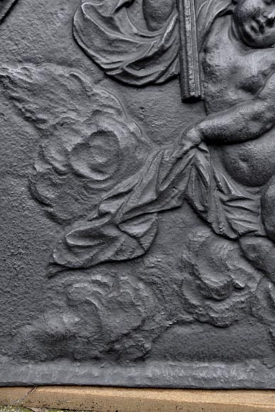 Antique fireback dated 1693 with winged putto holding a torch Antique fireback dated 1693 with winged putto holding a torch-3