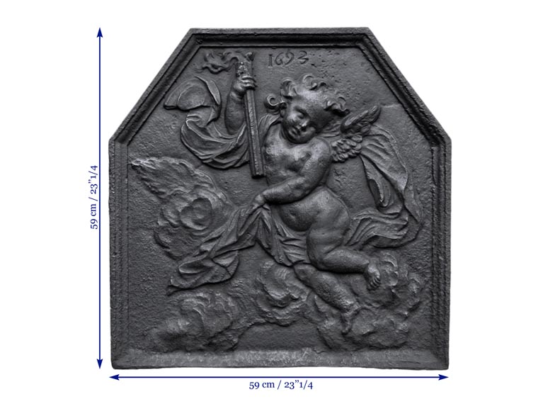 Antique fireback dated 1693 with winged putto holding a torch Antique fireback dated 1693 with winged putto holding a torch-5