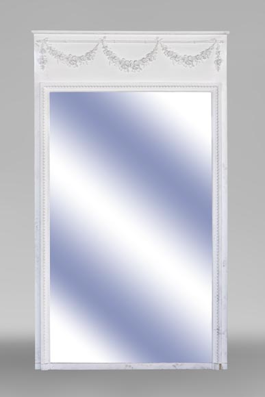 An antique large trumeau with garlands of flowers An antique large trumeau with garlands of flowers-0