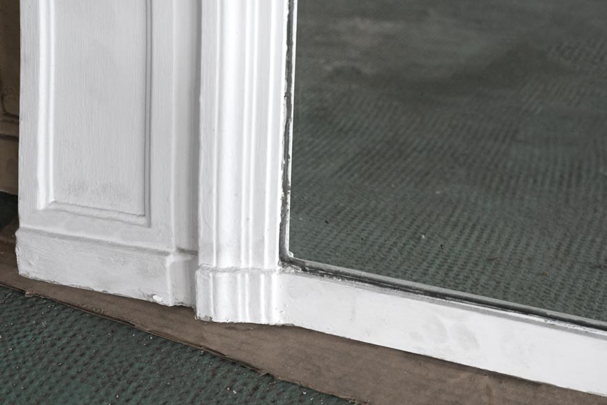 An antique trumeau made out of white wood and stucco An antique trumeau made out of white wood and stucco-2