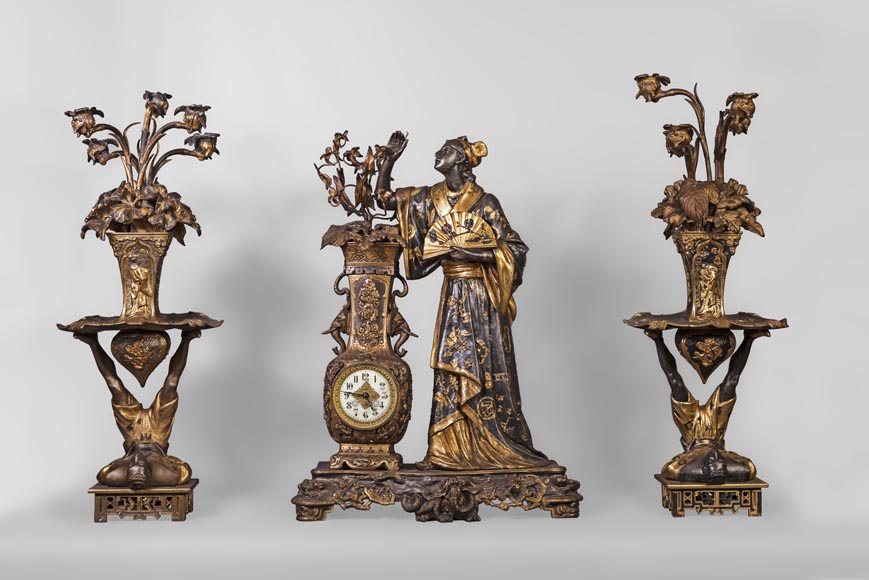 Arthur WAAGEN (active 1869-1910) Japanese-style clock set, made out of spelter, representing a young woman dressed in a kimono Arthur WAAGEN (active 1869-1910) Japanese-style clock set, made out of spelter, representing a young woman dressed in a kimono-0