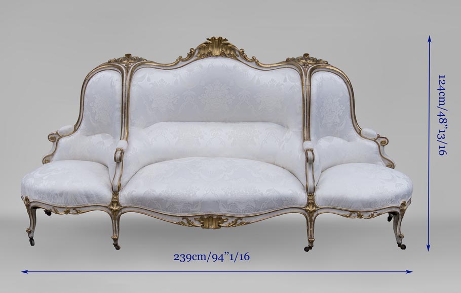 A large Louis XV style bench made out of gilded wood A large Louis XV style bench made out of gilded wood-15