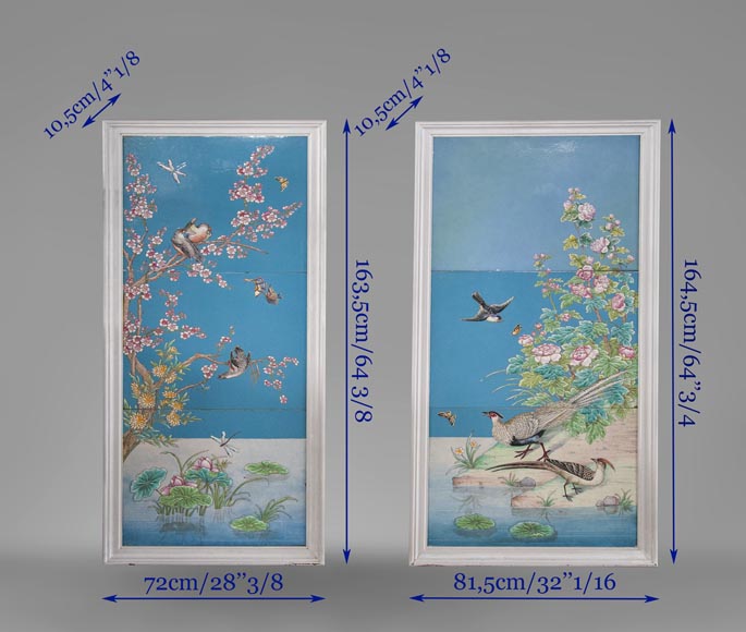 A pair of ceramic panels with birds in a lacustrine scenery signed A pair of ceramic panels with birds in a lacustrine scenery signed
