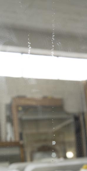 An antique Louis XV style overmantel with asymetric shell and crossbow pediment An antique Louis XV style overmantel with asymetric shell and crossbow pediment-5