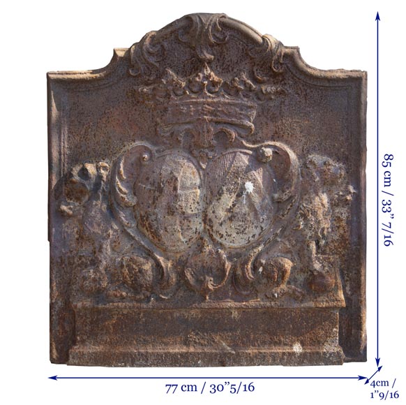 An old 18th century fireback with coat of arms and sitting lions An old 18th century fireback with coat of arms and sitting lions-7