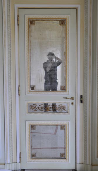 Pair of Louis XVI style wood, stucco and mirror doors, circa 1970   Pair of Louis XVI style wood, stucco and mirror doors, circa 1970-1