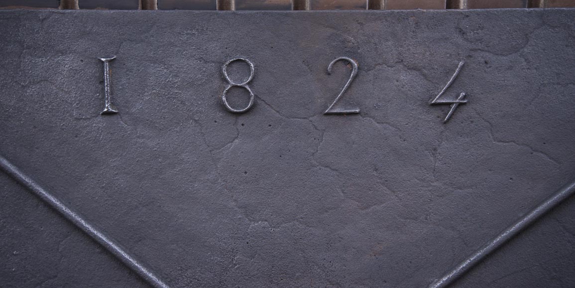 Antique fireback with Saint Andrew's Cross decoration dated 1824 Antique fireback with Saint Andrew's Cross decoration dated 1824-1