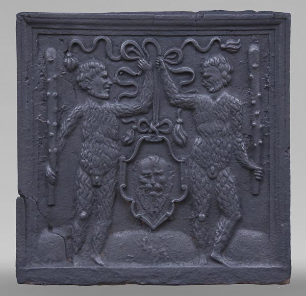 Antique fireback with two savages armed with masses Antique fireback with two savages armed with masses-0