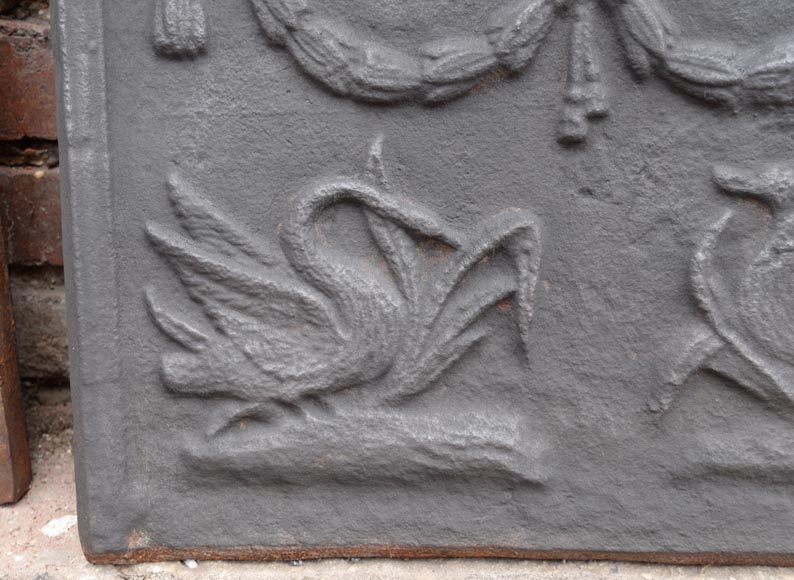 Small Louis XVI style cast iron fireback with a duck and a swann Small Louis XVI style cast iron fireback with a duck and a swann-2