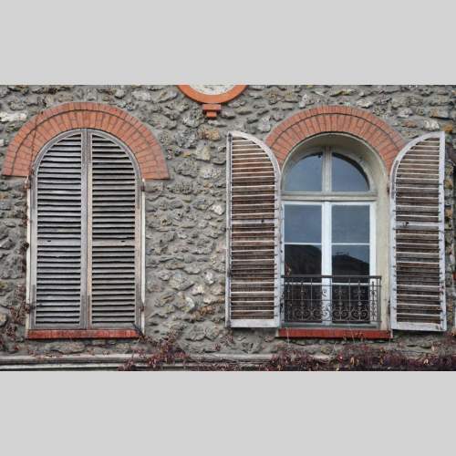 Two pairs of wooden shutters