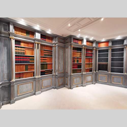Wood paneled room with trompe l'oeil library decoration, late 20th century