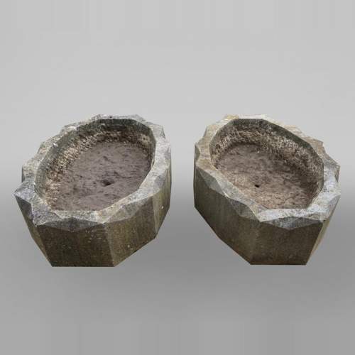 Pair of oval planters in stone