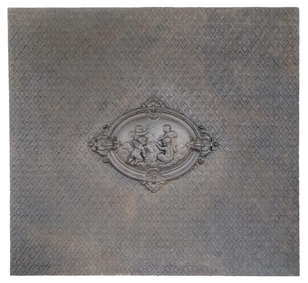Cast iron fireback with a Putti decoration  Cast iron fireback with a Putti decoration -0