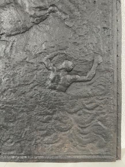 Cast iron fireback decorated with a chariot of Apollo Cast iron fireback decorated with a chariot of Apollo-8