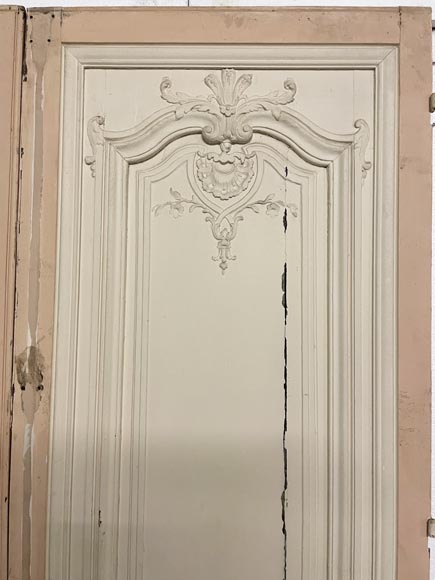 Beautiful sculpted wood double door with a monogram Beautiful sculpted wood double door with a monogram-4