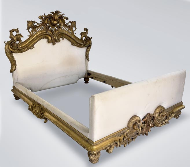 Gilt and sculpted wood bed with a very rich Rococo decoration and dragons coming from Marlène Dietrich's Parisian appartment Gilt and sculpted wood bed with a very rich Rococo decoration and dragons coming from Marlène Dietrich's Parisian appartment-0