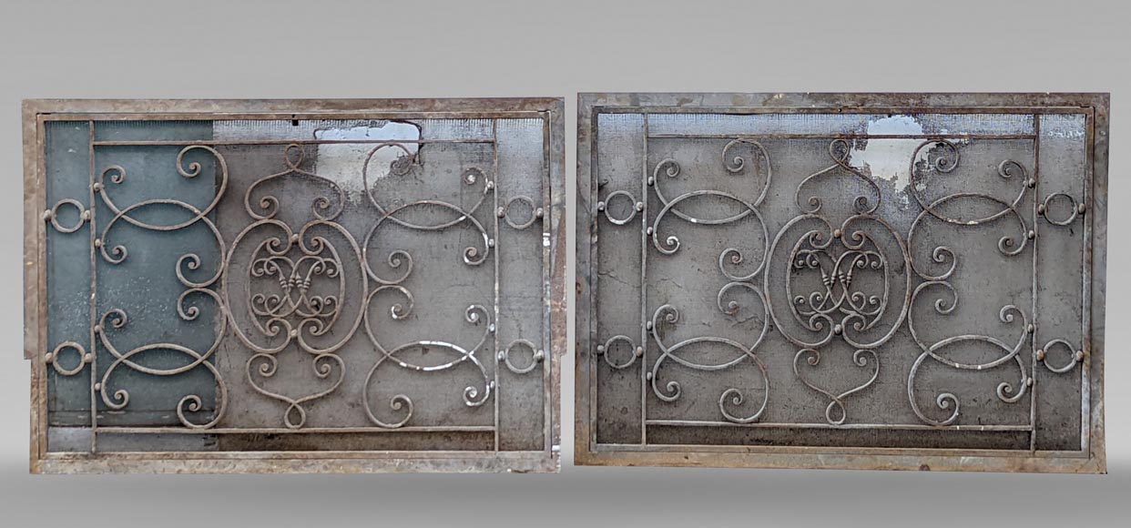 Pair of wrought iron front radiators with intertwined L Pair of wrought iron front radiators with intertwined L-0