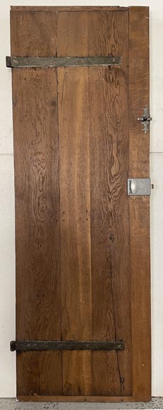 Series of three antique oak doors with their metal hinge Series of three antique oak doors with their metal hinge-1