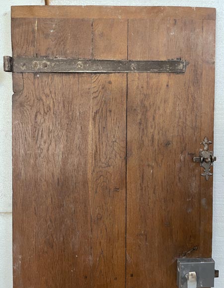 Series of three antique oak doors with their metal hinge Series of three antique oak doors with their metal hinge-8