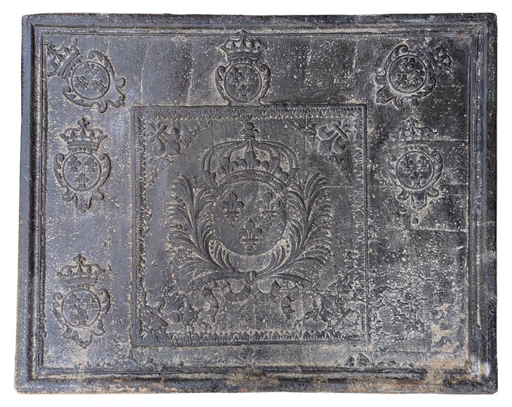 Antique cast iron fireback with the French coat of arms of the 18th century Antique cast iron fireback with the French coat of arms of the 18th century-0