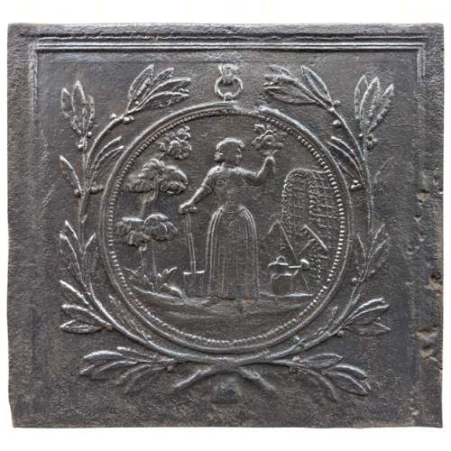 Fireback with medallion representing a shepherdess