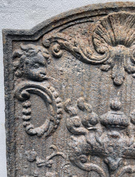 Cast iron fireback decorated with a smoking incense burner Cast iron fireback decorated with a smoking incense burner-3