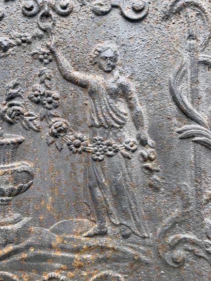 18th century fireback representing a female figure with a flower garland next to an antique vase 18th century fireback representing a female figure with a flower garland next to an antique vase-3
