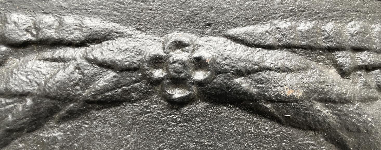 Fireback from the 18th century featuring a love playing with a goat Fireback from the 18th century featuring a love playing with a goat-4