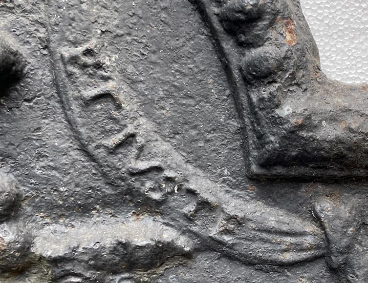 18th century fireback with two shields surrounded by three wild men 18th century fireback with two shields surrounded by three wild men-3