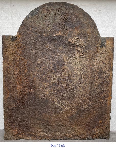 18th century fireback with two shields surrounded by three wild men 18th century fireback with two shields surrounded by three wild men-6