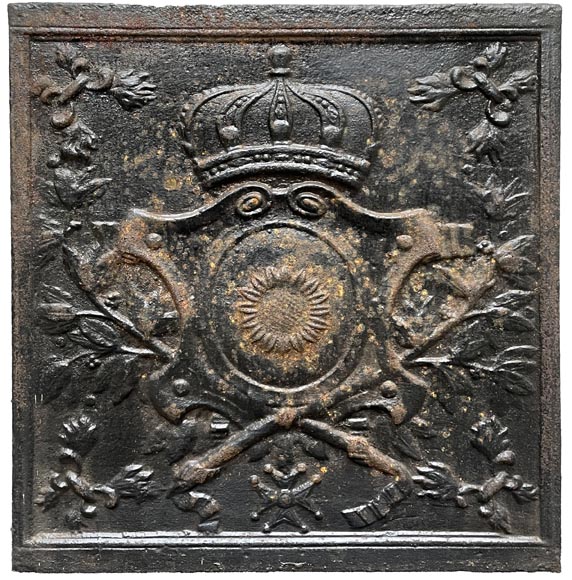 Fireback from the 19th century with a shield decorated with a sunflower Fireback from the 19th century with a shield decorated with a sunflower-0