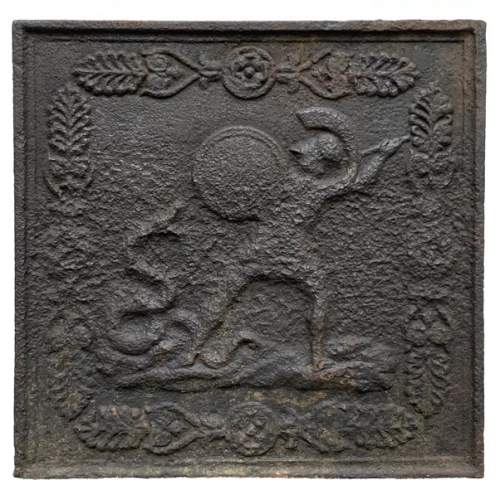 19th century fireback representing a mythological battle scene