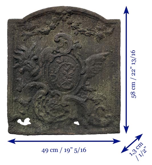 Small fireback in the Louis XV style, decorated with a medallion featuring an illuminated C. Small fireback in the Louis XV style, decorated with a medallion featuring an illuminated C.-6