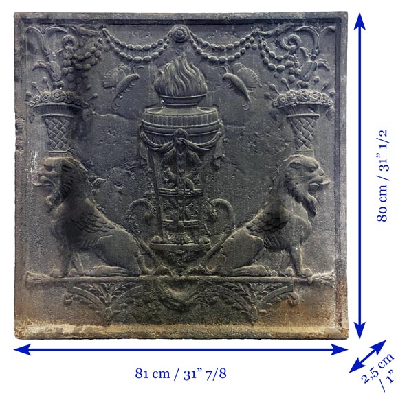 Fireback of the 18th century depicting a vase on a tripod with fire framed by two chimeras supporting baskets of fruit Fireback of the 18th century depicting a vase on a tripod with fire framed by two chimeras supporting baskets of fruit-6