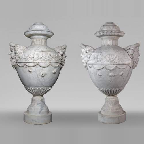 Pair of large marble vases decorated with theatre masks