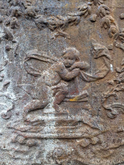 Fireback from the 19th century in the Louis XV style with the  Fireback from the 19th century in the Louis XV style with the