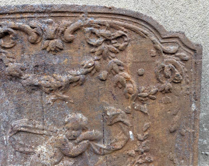 Fireback from the 19th century in the Louis XV style with the  Fireback from the 19th century in the Louis XV style with the