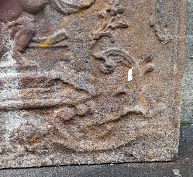 Fireback from the 19th century in the Louis XV style with the  Fireback from the 19th century in the Louis XV style with the