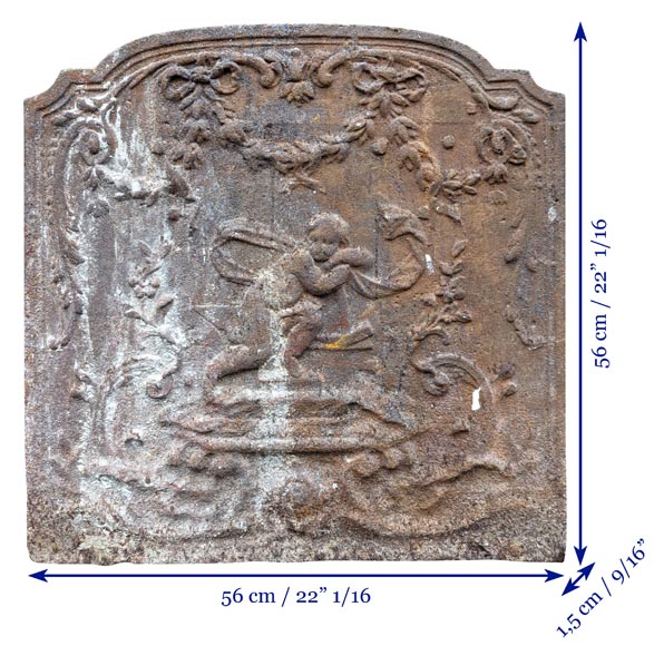 Fireback from the 19th century in the Louis XV style with the  Fireback from the 19th century in the Louis XV style with the